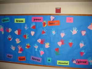 Give from your heart bulletin board A bulletin board of hearts & hands made by the kids
