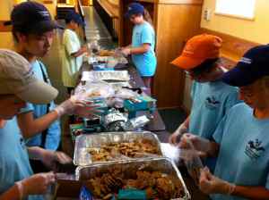 Grad Group preps food for LOVE Thy Neighbor