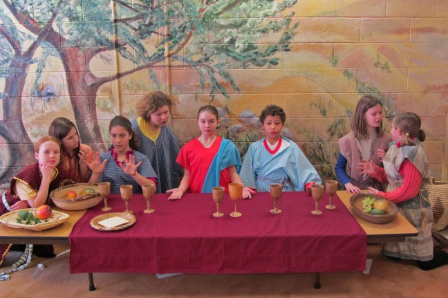 The 5th graders create a tableaux of The Last Supper