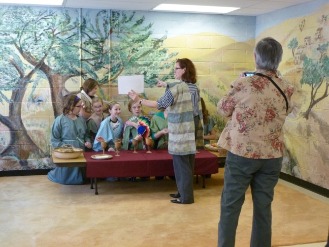 The workshop leader at work with her camera