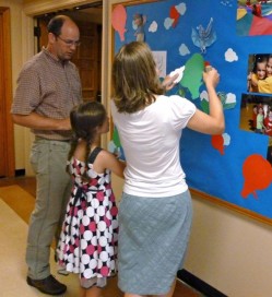 A family helps get ready for VBC