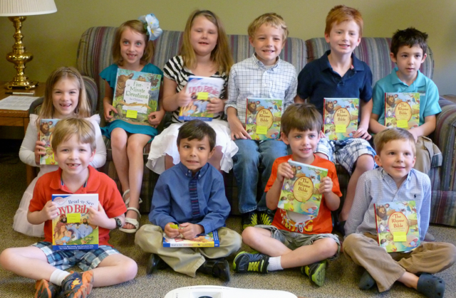 Kindergarteners with their new Bibles