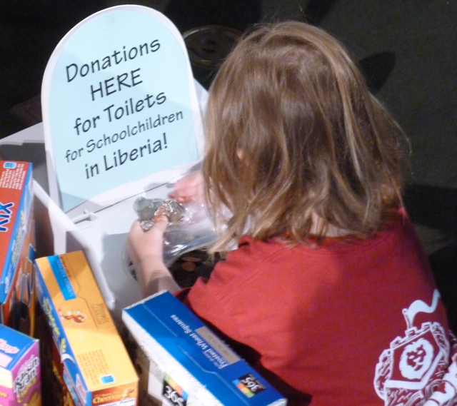 Depositing a fist full of coins