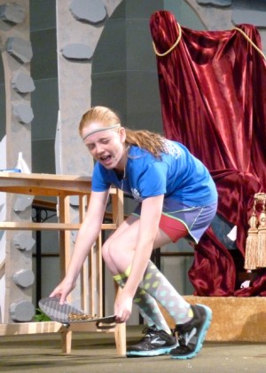 Wally attempts to lift a heavy shield