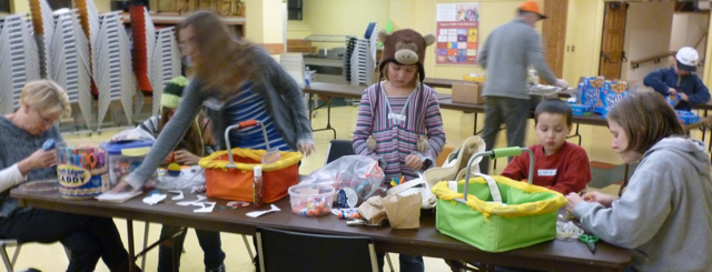 Families participate in a service project