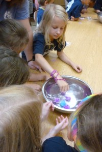 placing the sand in water