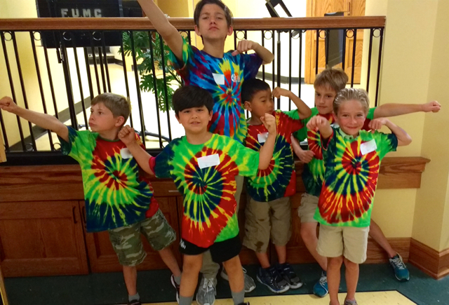 Crews are gathering for a photo.