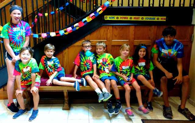 A crew takes a break for their crew photo.