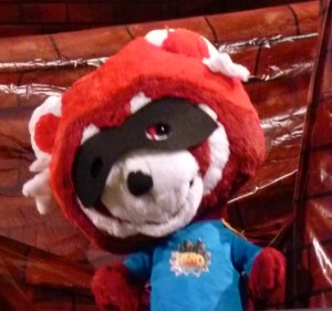 the sidekick, Flame the Red Panda